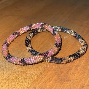 Pink and black beaded bracelets